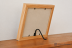 Clip-on standaard voor fotolijsten