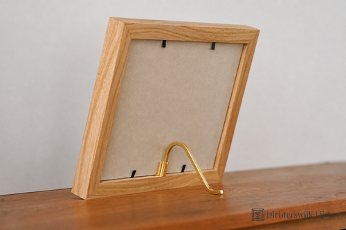 Clip-on standaard voor fotolijsten